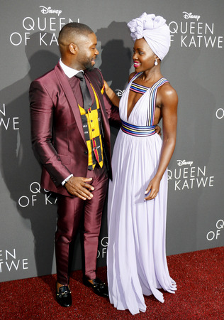 63244035 - david oyelowo and lupita nyong'o at the los angeles premiere of 'queen of katwe' held at the el capitan theatre in hollywood, usa on september 20, 2016.