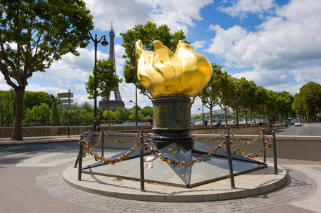 44268174 - paris, france - july 29, 2015: liberty flame on the pont d'alma in paris in france. the tunnel underneath this monument was the place where lady di had her car accident and died.
