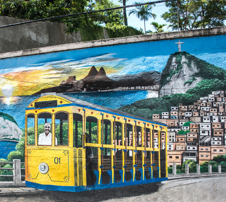 Rio de Janeiro - 55062718 - rio de janeiro, brazil - february 19, 2016: street artists painted the walls of the santa teresa district to re-opening of the tram line, which was closed down for many years