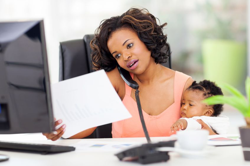 Mums: How to keep your sanity while launching your business! 22061969 - african american woman with baby girl working from home