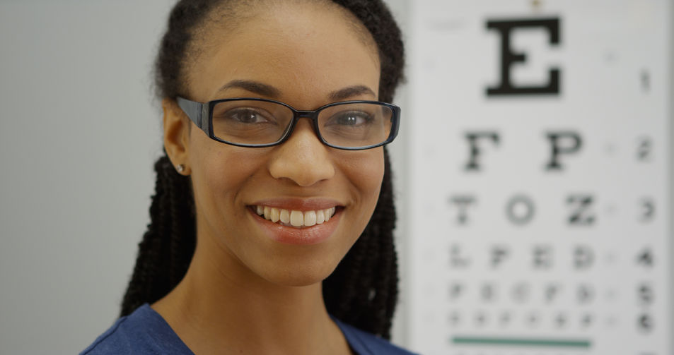 Look after your eyes; get them checked regularly - 50870130 - black woman wearing glasses smiling