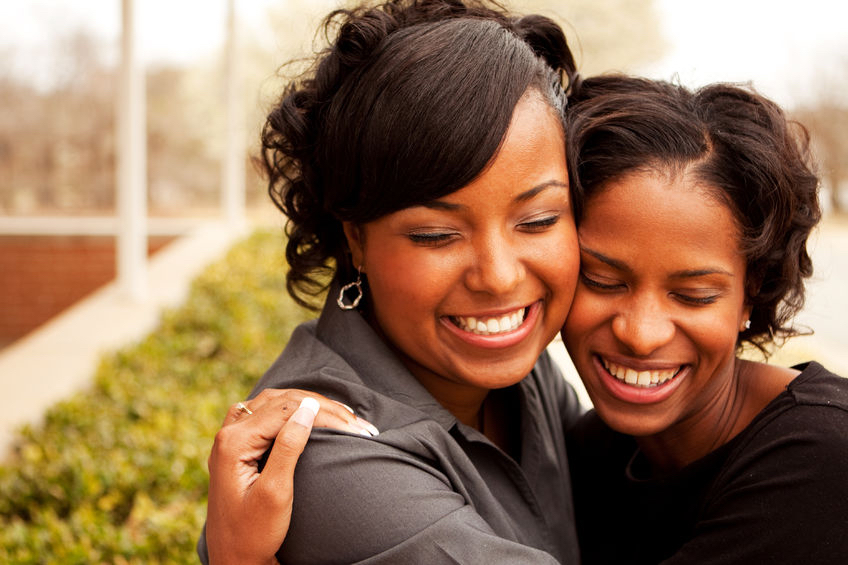 77299865 - happy african american women laughing and smiling. Six simple ways to support your bestie who’s starting a business