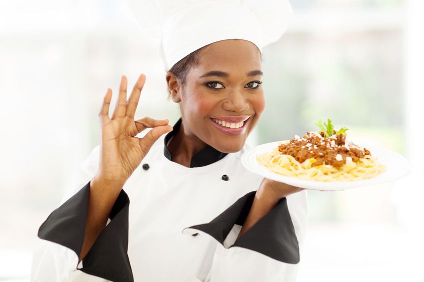 21512949 - attractive young african chef with delicious pasta dish - 50 signs that prove you are a good cook! 