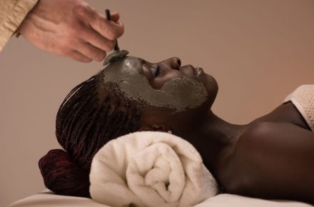 34555867 - beautiful african woman having clay facial mask applying by beautician Have you tried a DIY Facemask lately?