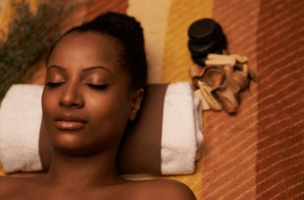 Get the glow: use these top tips to maintain healthy skin this winter 73508267 - close-up image of african-american woman with beautiful glowing skin enjoying spa treatment