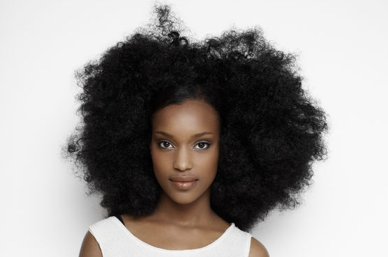 38070963 - african girl wearing casual white clothes. 10 simple tips to help you grow healthy Afro natural hair