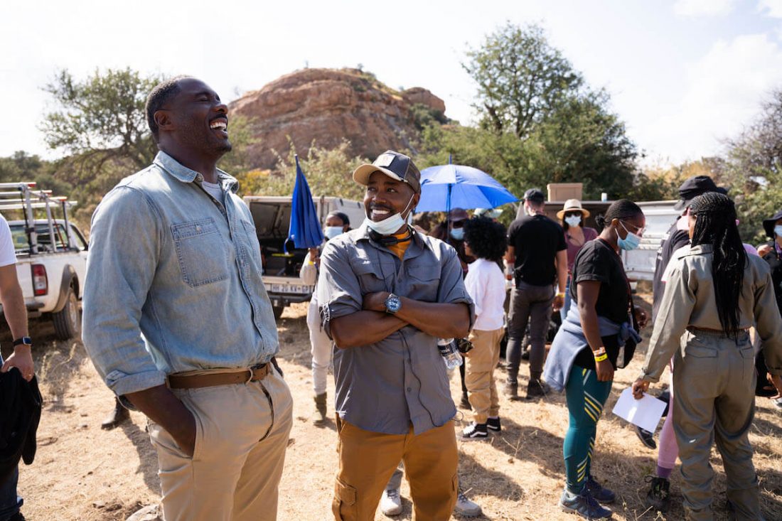 Idris Elba and producer Will Packer on the set of Beast