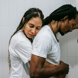 A woman and a man hugging