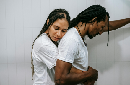 A woman and a man hugging